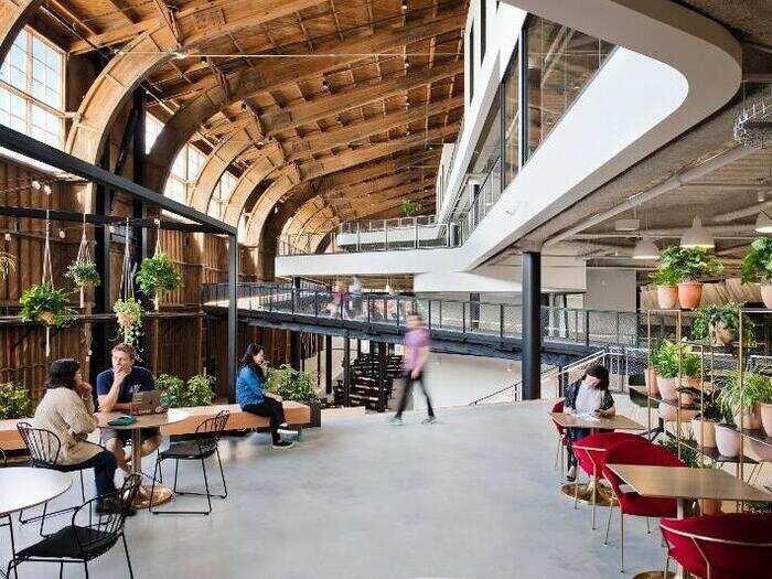 Wood arches and siding were preserved and exposed in the interior of the space.