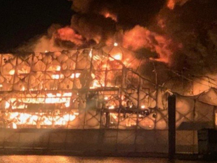 Because both boats were undergoing renovations, they were covered in scaffolding when they caught on fire in the marina.