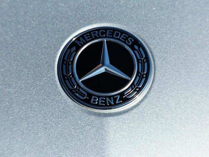 The Mercedes tri-star badge is prominent against the blacked-out grille, with a pair of chrome wings that add some real design energy to the fascia. And of course, the hood ornaments of yore, so easy to steal, have been supplanted by bas-relief badges.