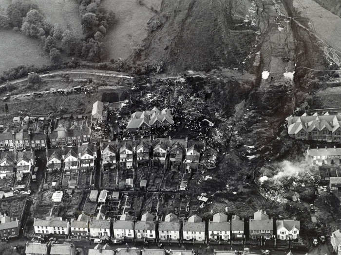 At 9.15 a.m., 300,000 cubic yards of coal sludge came sliding down the hill at more than 80 mph, and engulfed Pantglas Junior School, and 19 houses. Alun Davies, who was 16 at the time, told Wales Online, it was like a black cloak had enveloped the mountain.