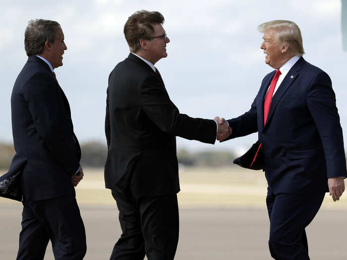 Trump met with Texas Lt. Gov. Dan Patrick and Attorney General Ken Paxton as he arrived at Austin-Bergstrom International Airport.