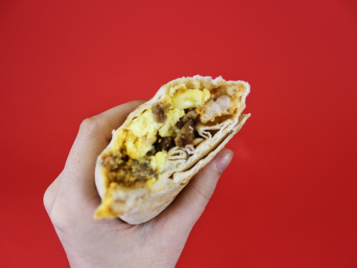 The eggs were fluffy and moist, without being watered down, and the addition of sour cream and nacho cheese sauce gave the burrito a hint of tanginess. Crispy hash browns added a different texture element that brought the burrito together. The sausage was hearty and filling.