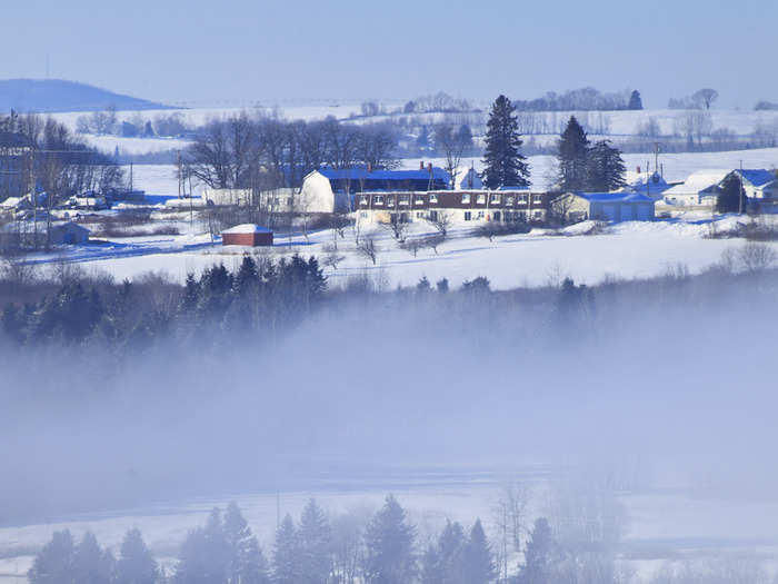 Caribou, Maine, known as the coldest town in New England, and one of its northernmost cities, broke a record for the most consecutive days with at least an inch of snowfall last winter, with 157 days in a row. The coldest recorded temperature is -41 degrees Fahrenheit, and the wind can blow so hard that 3 inches of snow can turn into 4-foot snow drift, dense enough to stop traffic.