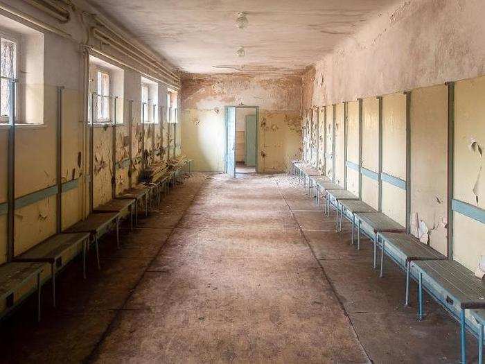 There were a number of athletic facilities on the campus, including a swimming pool. To get there, I headed through this former locker room.