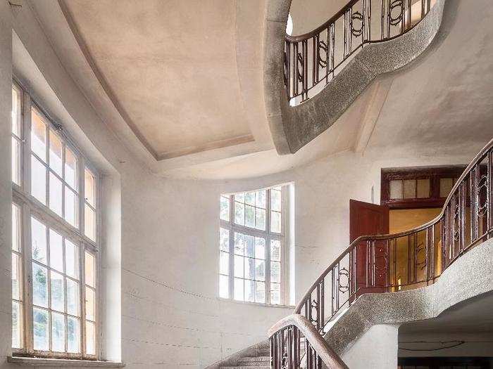 This grand staircase leads to the upper floor of the main building of the base.