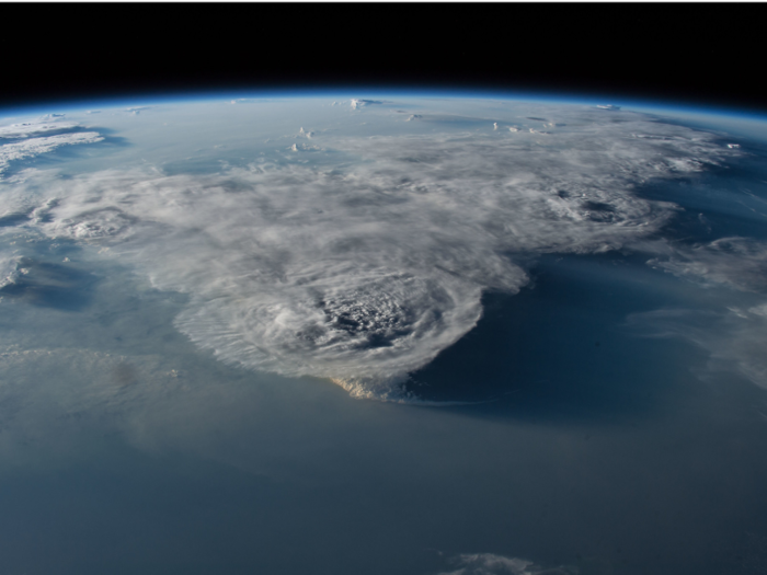 Sometimes the clouds themselves make beautiful shapes. Astronauts can watch big storms from above.