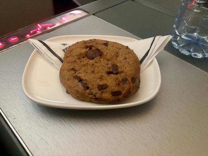 A few hours in, the flight attendants came around with warm chocolate chip cookies, a staple of Delta One flights between the US and Europe.