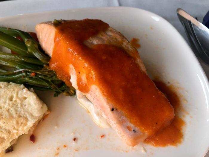 The plating was a bit weird, and water from the broccolini made it soggy, but everything was really tasty. The fish, especially — I was impressed that they could pull off a good salmon fillet on a plane.