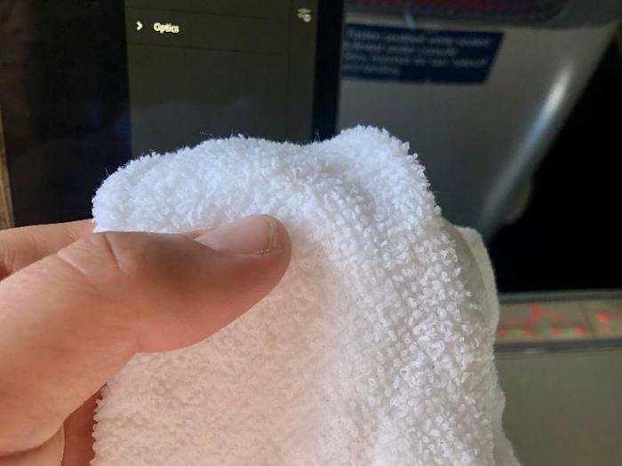 About 10 minutes after we left the ground, the flight attendants sprang into action, coming around to hand out hot towels ...