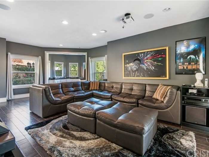 As does this living room, which is one of many throughout the home.