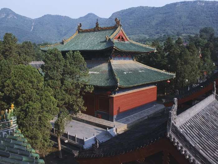 Within these walls, first erected in 495 AD to teach Buddhism, thousands of eager students have come to learn kung fu, hoping to become warrior monks. Because of all the attacks over the years, most of the temple buildings standing today were built in the last 100 years.