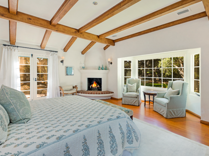 The master bedroom has vaulted ceilings and a bay window ...