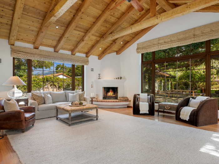 There are multiple spacious lounging areas and five fireplaces throughout the home.