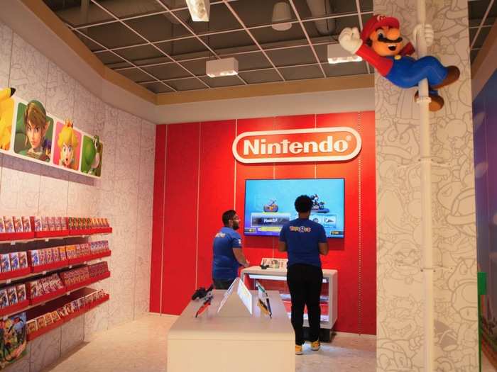 A large part of this store was focused on experience and play. In the Nintendo section, shoppers had the chance to test out some gaming systems on a large screen or handheld device.