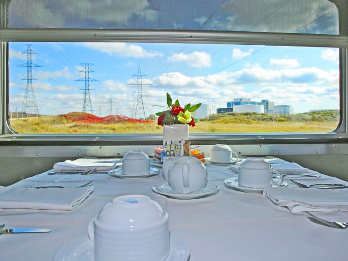 Leather-bound menus, beautiful dishware, and lovely tablescapes greeted passengers as we sat down.