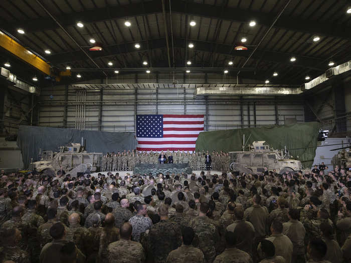 About 1,500 troops watched him speak. He told them he wanted to reduce troops in Afghanistan from about 13,000 to 8,600. He also said the Afghanistan war would not be decided on the battlefield but by people from Afghanistan and with a political solution.