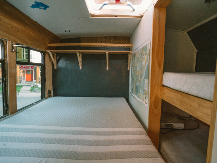 There is a full-size bed for the parents, and two smaller bunk beds for the children, all in the same room.