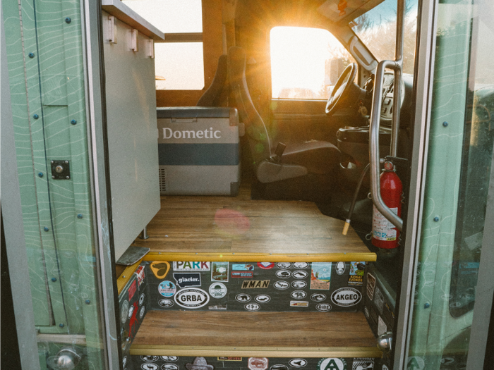 A plywood subfloor was placed on top of the insulation. The couple decided on vinyl plank instead of hardwood because they claim it is lighter, waterproof, and more flexible and durable.