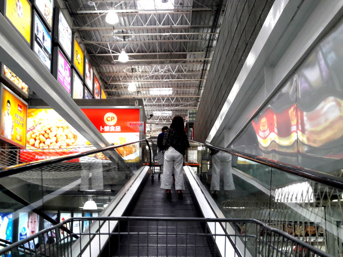 It has an escalator that holds shopping carts ...