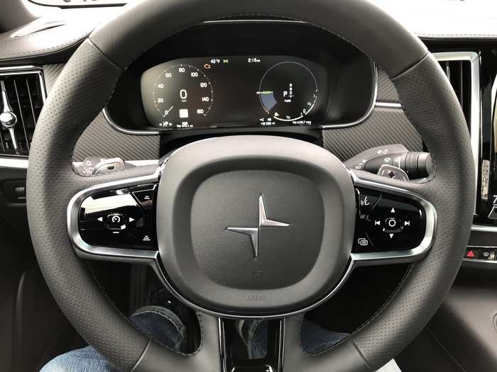 The multifunction steering wheel, instrument cluster, and other interior details are borrowed from Volvo.