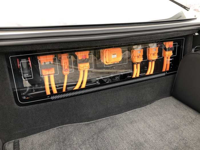 It showcases the battery-electric connections, behind a clear panel. They have to be bright orange so that emergency crews can identify them.