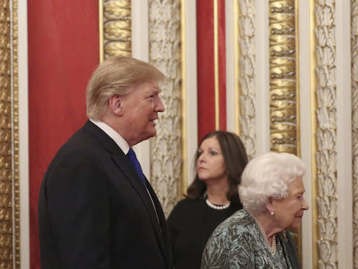 Trump is seen with Queen Elizabeth II at the NATO reception at Buckingham Palace.