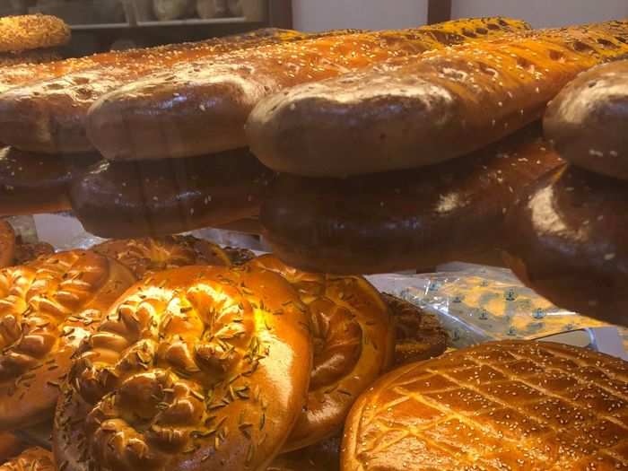 The bottom shelf shows walnut-stuffed bread, a particular specialty. The bakery also has gluten-free bread, a relatively new phenomenon.