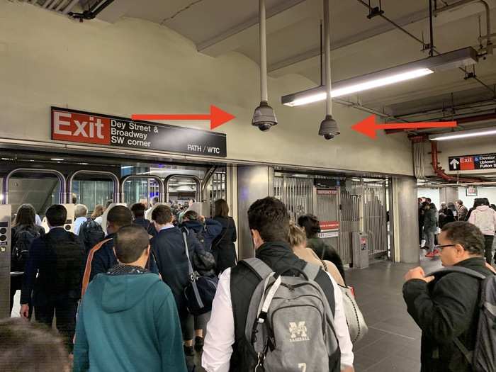 A little paranoid, I quickly got on a train heading downtown, and was again in the gaze of a camera. Getting off at Fulton Station, I saw these two right away. More than 27 million people pass through the transit hub every year.