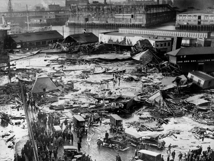 A tank exploded in Boston, flooding a neighborhood with molasses and killing two dozen people.