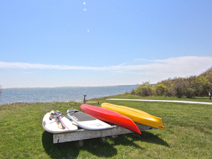 The property comes with a boathouse and private beachfront.