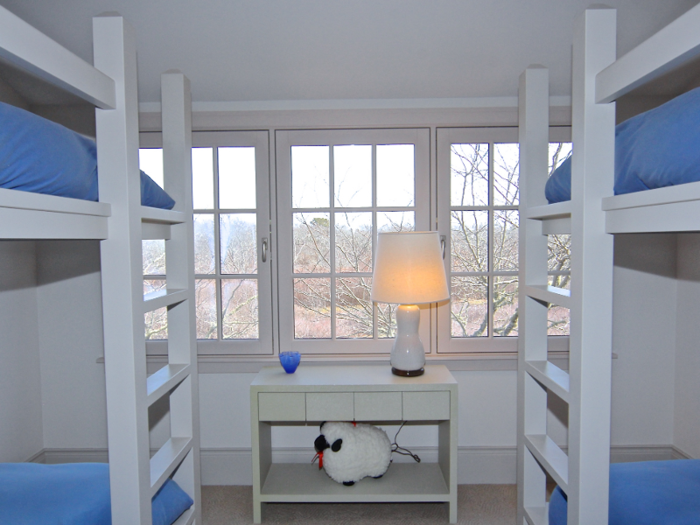 One of the bedrooms is set up with bunk beds for children or multiple guests.