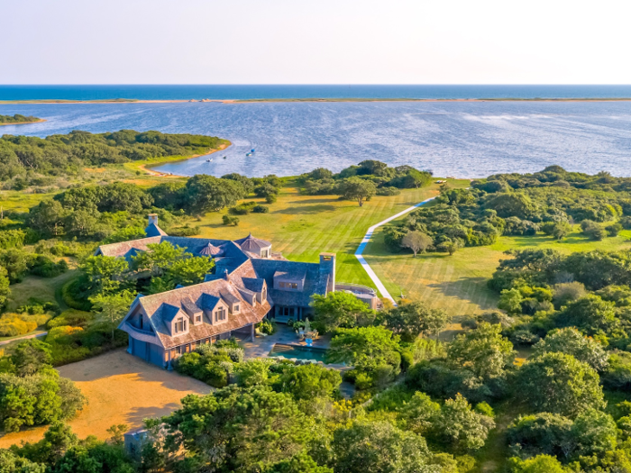 The nearly 7,000-square-foot home sits on 29 waterfront acres overlooking Edgartown Great Pond.