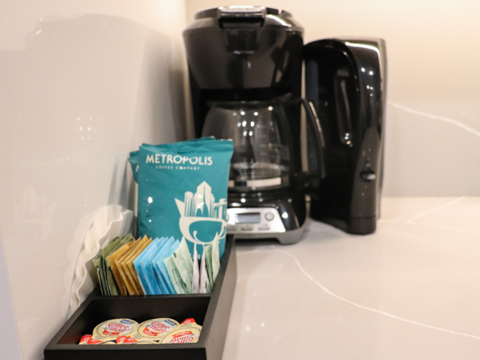 A coffee station came stocked with coffee and creamer, as well as various types of teas.