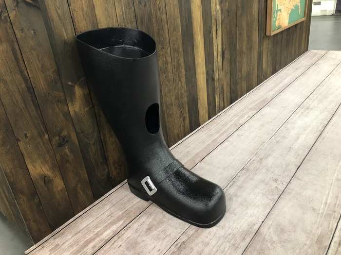 A big plastic motorcycle boot. I have no idea what it