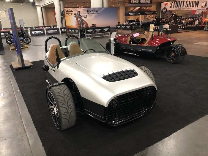 Nearby was this groovy three-wheeler. The model, the Carmel, is from Vanderhall Motors of Utah. It splits the difference between a motorcycle and a car.