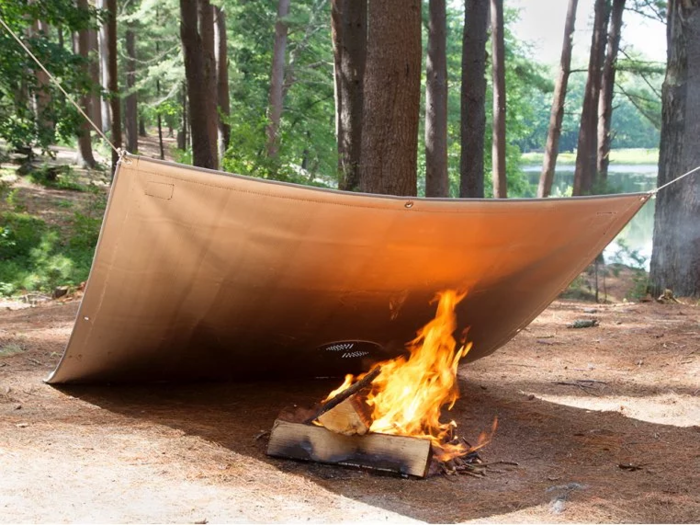 A campfire defender to keep their campfires (and maybe them) dry