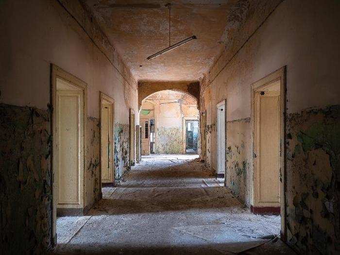 The dark corridors with peeling paint on the walls make wandering around the abandoned complex a creepy experience.