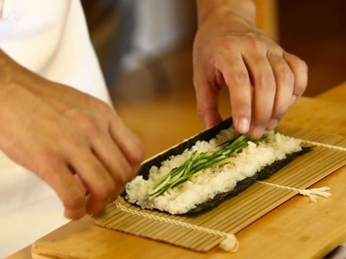 Make sushi rolls in Tokyo