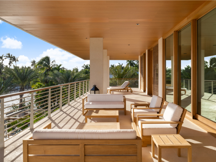 A teak deck overlooks the more than 150 feet of private waterfront.