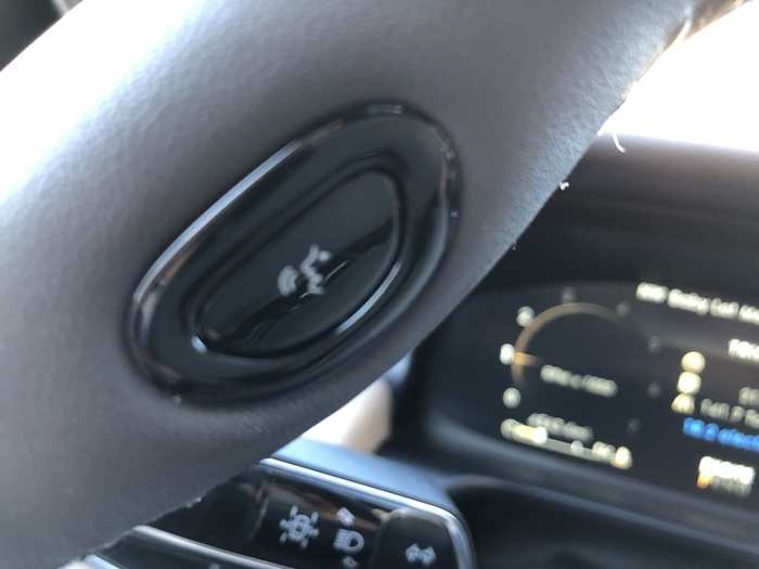 THIS IS A GOOD IDEA! Put the voice-interface button right on the wheel.