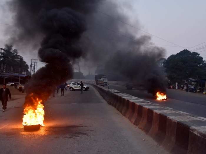 People burnt tires on the roads, threw bricks at the police, forcibly shut down shops and markets in Assam after CAB moved to the Rajya Sabha for approval.