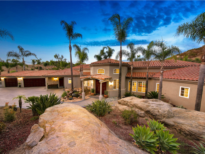 The main home has a three-car garage, but there’s also a second garage or a car museum.