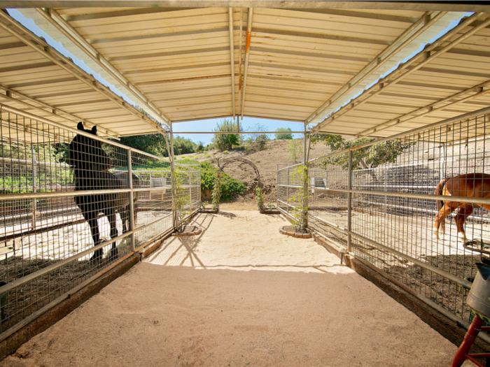 The property also has 15 miles of riding trails and four horse stalls. Racehorse training facility Moody Creek Farms is nearby.