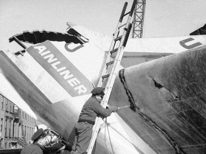 Two days after the crash, authorities severed parts of the plane to remove it from the Brooklyn street.