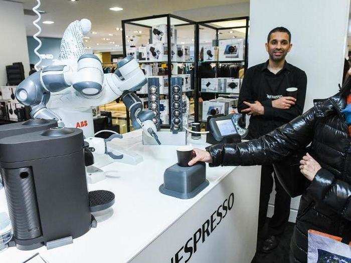 Finally, a robot serves shoppers their choice of Nespresso coffee to finish off a visit to the department store.