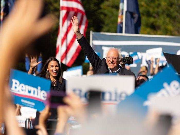 Alexandria Ocasio-Cortez joins Bernie Sanders for the 1st time on the 2020 campaign trail, drawing 25,000 supporters to a Queens rally