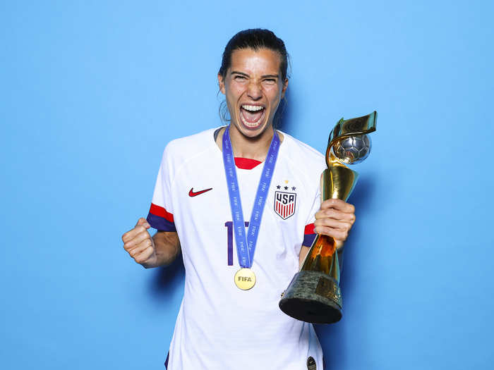 Striker Tobin Heath poses with the World Cup trophy after the US Women