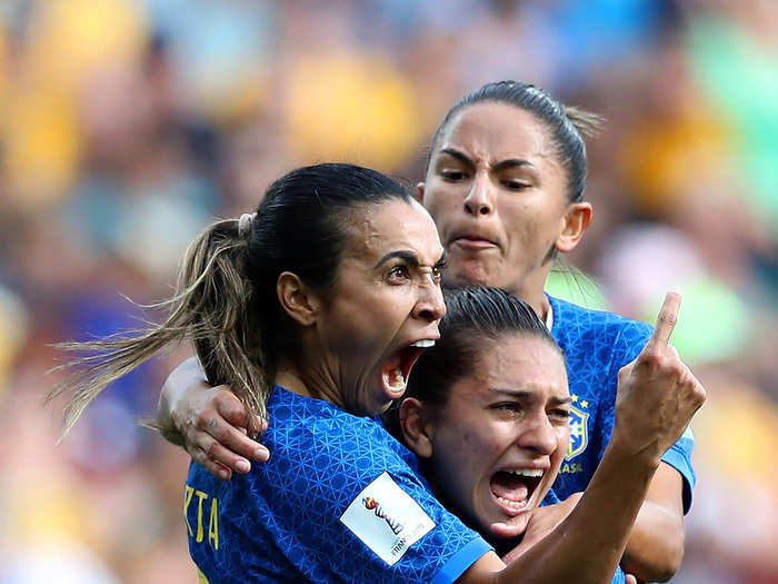 Brazilian soccer legend Marta and teammates celebrate her goal against Australia during their 2019 World Cup in Montpellier, France.