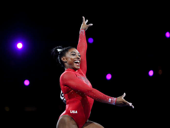 Simone Biles reacts after her routine in Women