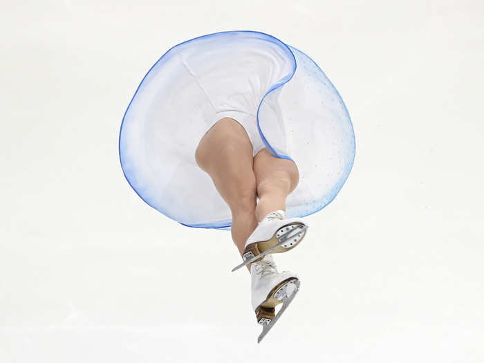 Apollinariia Panfilova is tossed into the air during the Junior Pair Free Skate at the ISU Junior Grand Prix of Figure Skating in Lake Placid, New York.